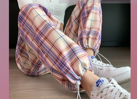 Pantaloni de damă în carouri de ultimă generație cu șireturi