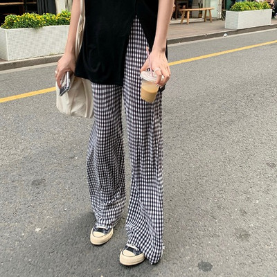 Sieviešu ikdienas rūtainu bikšu plats modelis