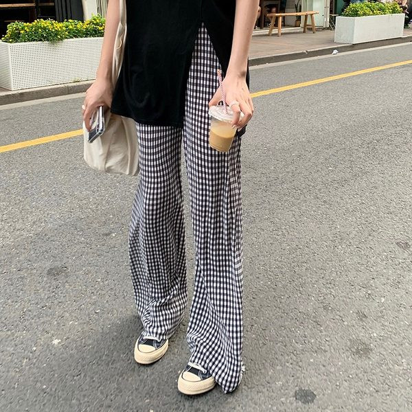 Sieviešu ikdienas rūtainu bikšu plats modelis