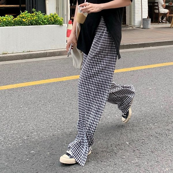 Sieviešu ikdienas rūtainu bikšu plats modelis