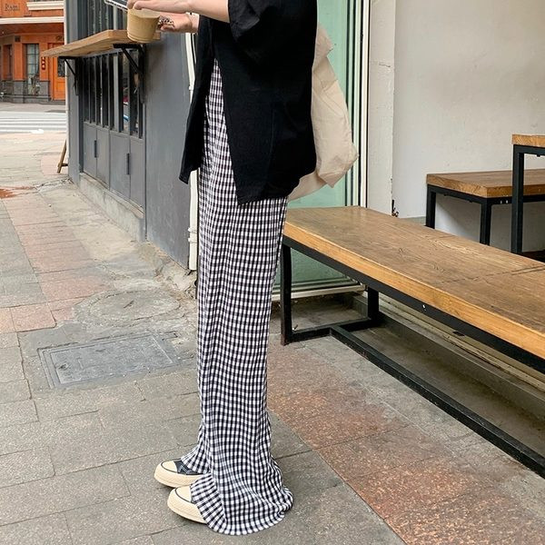 Sieviešu ikdienas rūtainu bikšu plats modelis