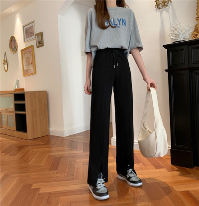 Sieviešu ikdienas bikses ar mežģīnēm un šķēlumu taisnu modeli