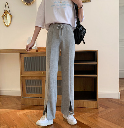 Sieviešu ikdienas bikses ar mežģīnēm un šķēlumu taisnu modeli