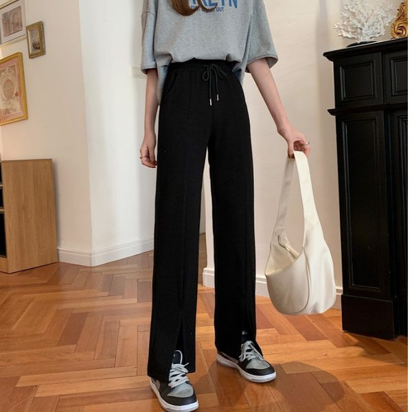 Sieviešu ikdienas bikses ar mežģīnēm un šķēlumu taisnu modeli