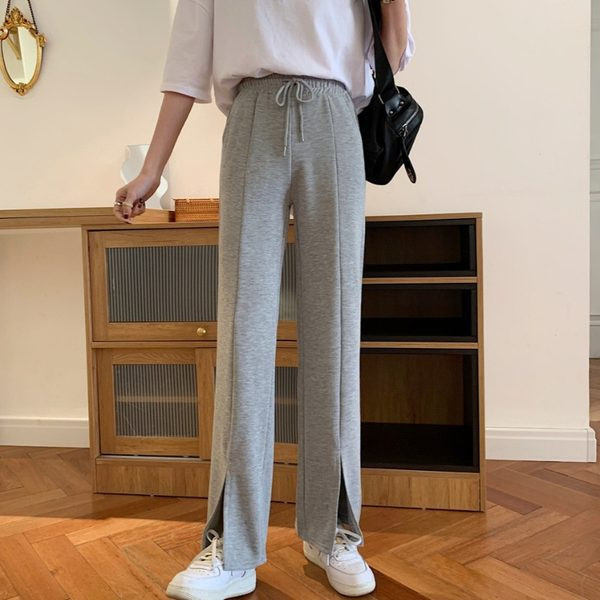 Sieviešu ikdienas bikses ar mežģīnēm un šķēlumu taisnu modeli