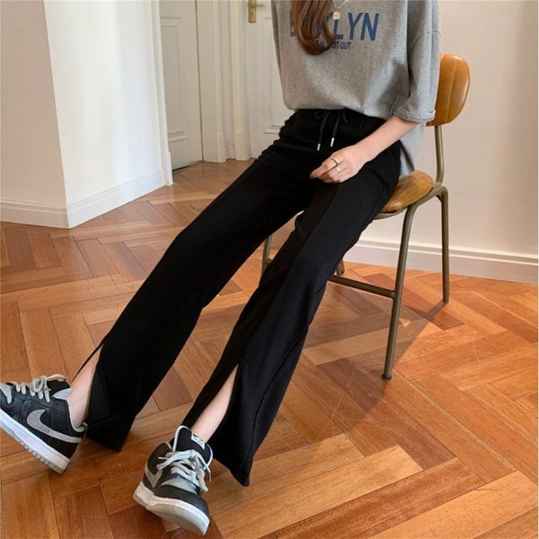 Sieviešu ikdienas bikses ar mežģīnēm un šķēlumu taisnu modeli