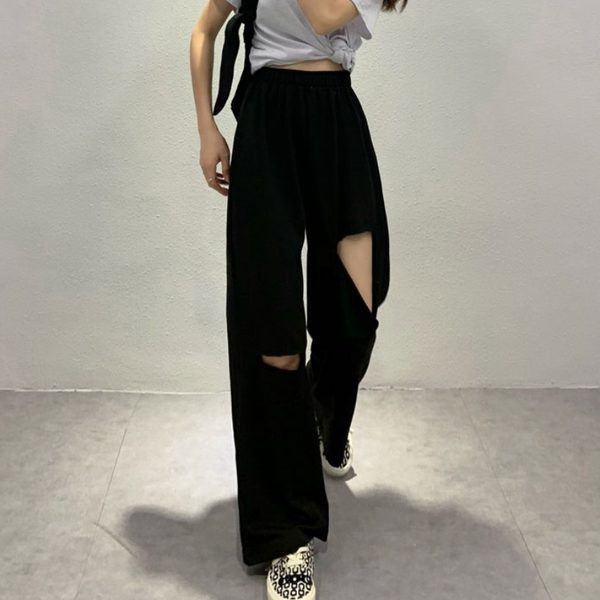 Sieviešu bikšu plats modelis ar saplēstiem motīviem