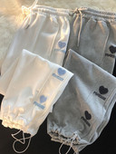 Ravni model ženskih hlača s vezom i vezicama