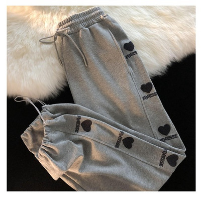 Ravni model ženskih hlača s vezom i vezicama