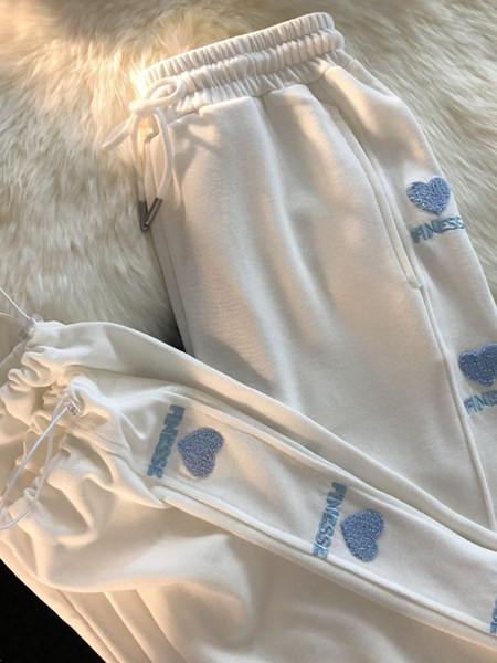 Ravni model ženskih hlača s vezom i vezicama