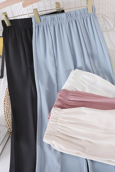 Sieviešu bikses ar elastīgu jostasvietu un šķēlumiem - vairākas krāsas