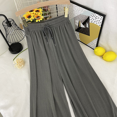 Sieviešu garas platas bikses ar elastīgu jostasvietu un saitēm