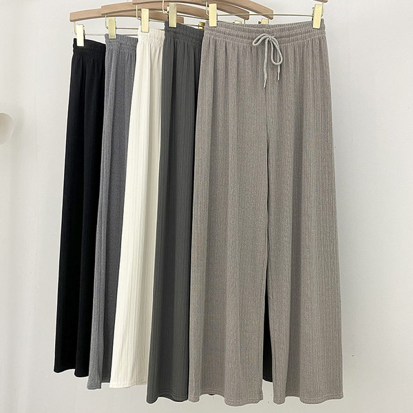 Sieviešu garas platas bikses ar elastīgu jostasvietu un saitēm