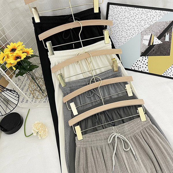 Sieviešu garas platas bikses ar elastīgu jostasvietu un saitēm