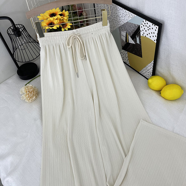 Sieviešu garas platas bikses ar elastīgu jostasvietu un saitēm