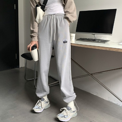 Ikdienas sieviešu bikses ar saitēm un izšuvumiem