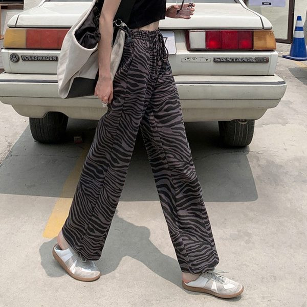 Modernas sieviešu taisna modeļa bikses ar dzīvnieku apdruku