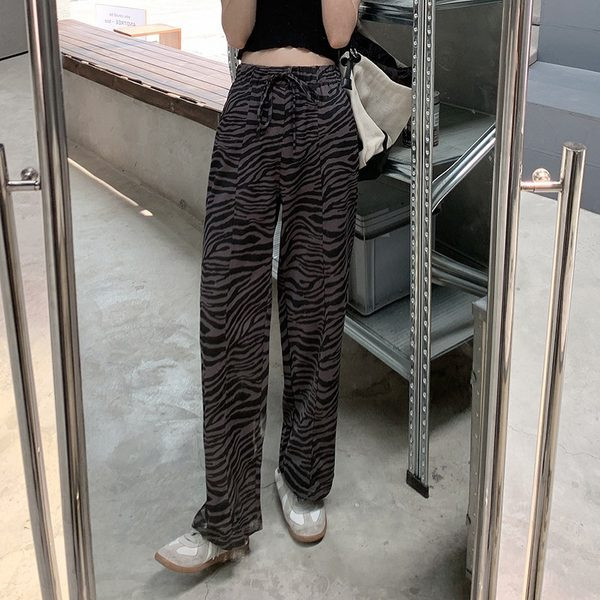 Modernas sieviešu taisna modeļa bikses ar dzīvnieku apdruku