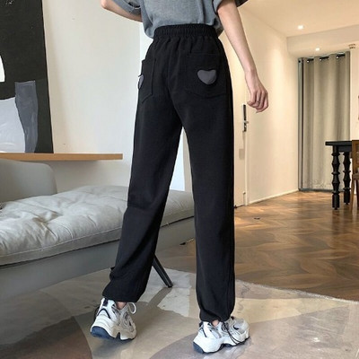 Sieviešu bikses ar saitēm un izšuvumiem