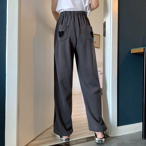 Sieviešu bikses ar saitēm un izšuvumiem