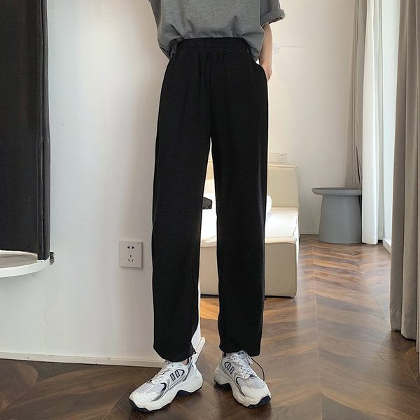 Sieviešu bikses ar saitēm un izšuvumiem