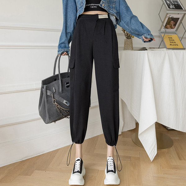 Sieviešu bikses ar sānu kabatām un augstu vidukli