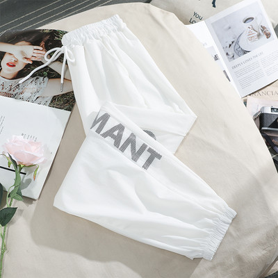 Sieviešu garās bikses ar saitēm un uzrakstu