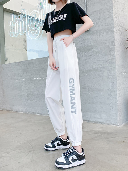 Sieviešu garās bikses ar saitēm un uzrakstu