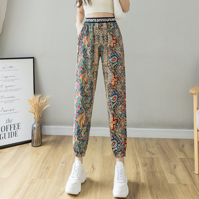 Moteriškos spalvingos vasarinės kelnės su užrašais ir aukštu juosmeniu