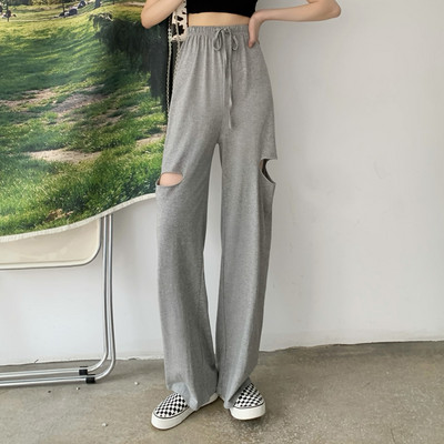 Ikdienas sieviešu bikses ar saitēm un saplēstiem motīviem