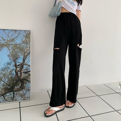 Ikdienas sieviešu bikses ar saitēm un saplēstiem motīviem