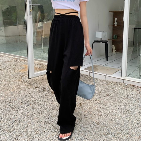 Ikdienas sieviešu bikses ar saitēm un saplēstiem motīviem