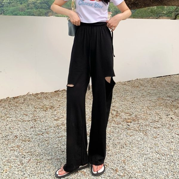 Ikdienas sieviešu bikses ar saitēm un saplēstiem motīviem