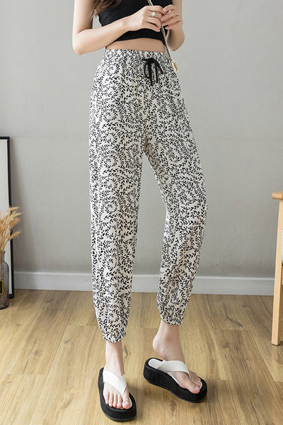 Sieviešu ikdienas bikses ar saitēm un gumiju pie potītēm