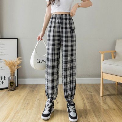 Rūtainas sieviešu bikses ar elastīgu jostasvietu trīs krāsās