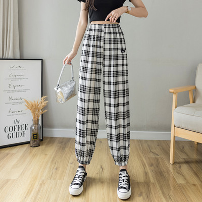 Rūtainas sieviešu bikses ar elastīgu jostasvietu trīs krāsās