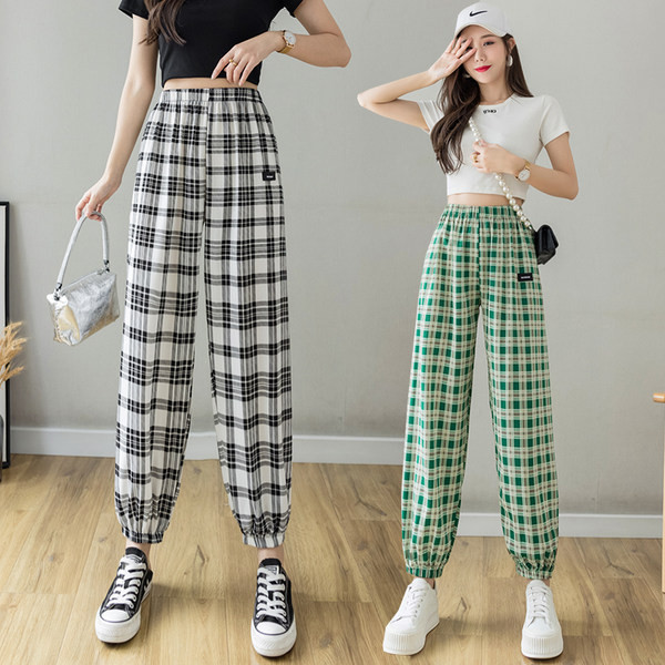 Rūtainas sieviešu bikses ar elastīgu jostasvietu trīs krāsās