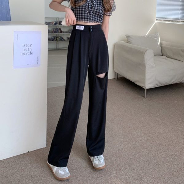 Model larg de pantaloni de dama cu motive rupte