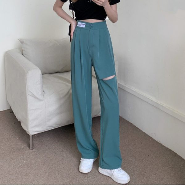 Model larg de pantaloni de dama cu motive rupte