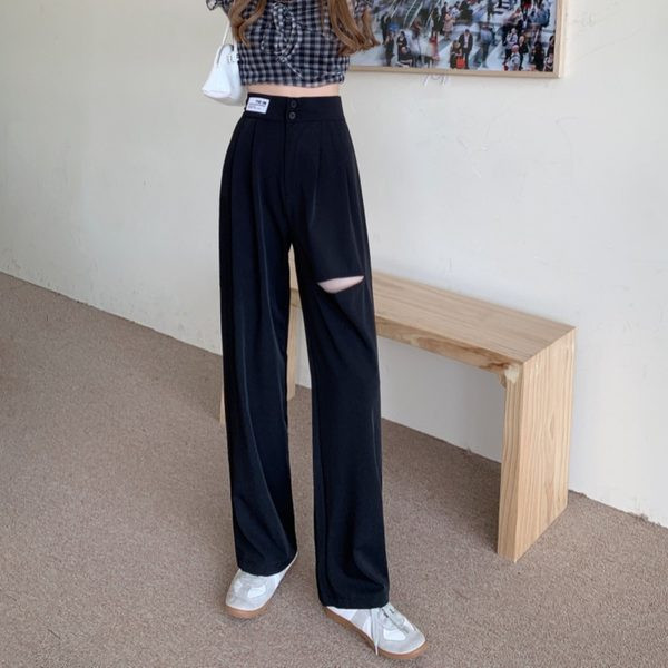 Model larg de pantaloni de dama cu motive rupte