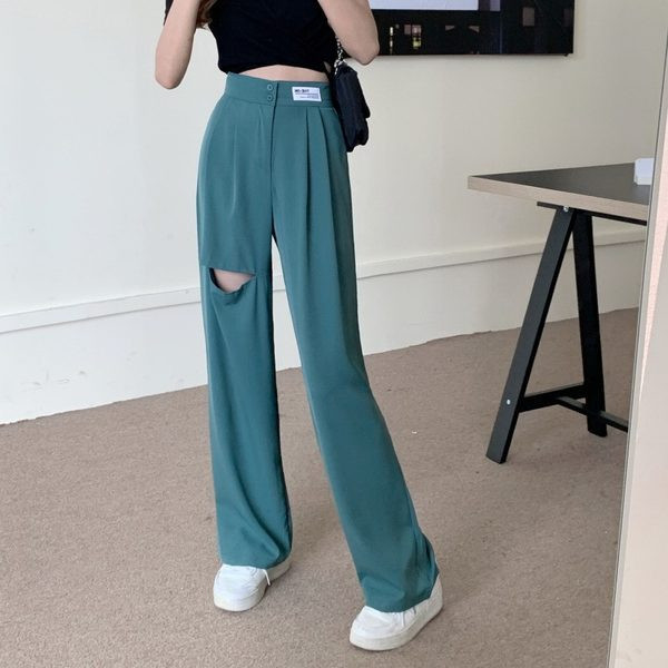 Model larg de pantaloni de dama cu motive rupte