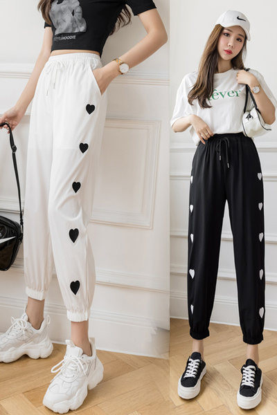 Sieviešu ikdienas bikses ar kabatām un saitēm