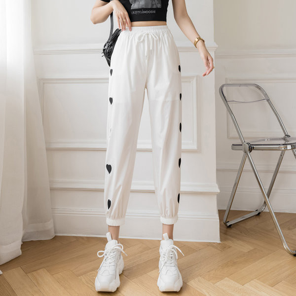 Sieviešu ikdienas bikses ar kabatām un saitēm