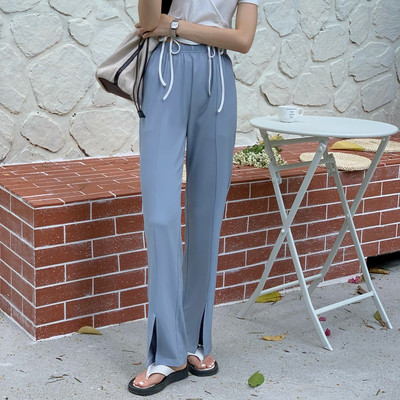 Pantaloni de dama cu talie elastica inalta si crapata