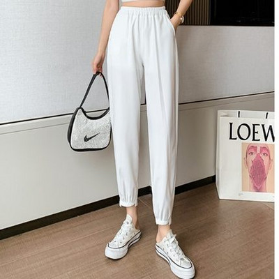 Sieviešu vienkrāsainas bikses ar elastīgu jostasvietu un kabatām