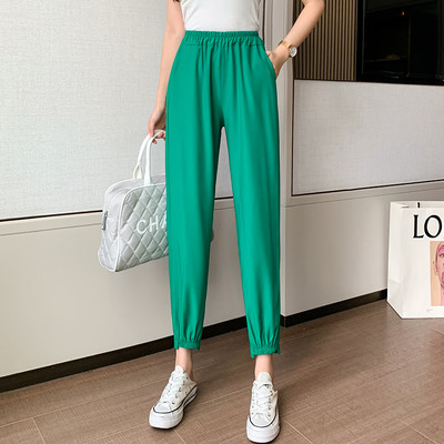 Sieviešu vienkrāsainas bikses ar elastīgu jostasvietu un kabatām