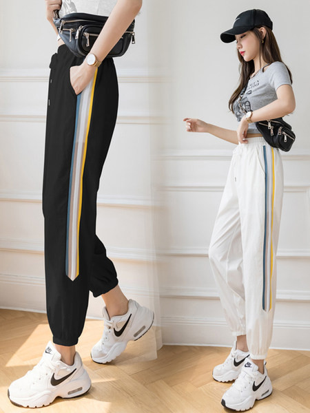 Sieviešu sporta bikses ar apmali baltā un melnā krāsā