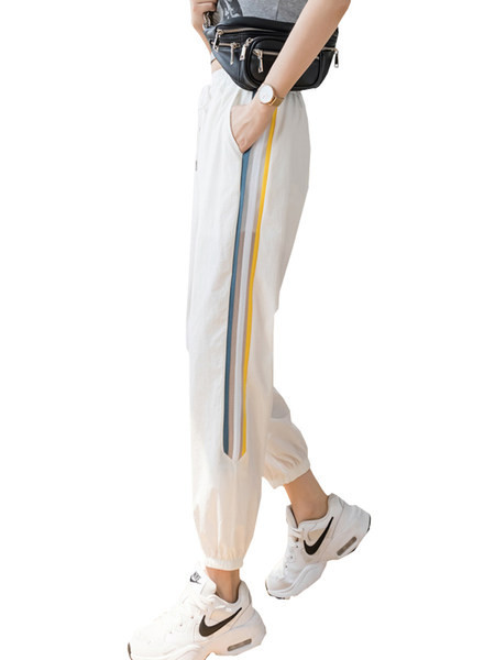 Sieviešu sporta bikses ar apmali baltā un melnā krāsā