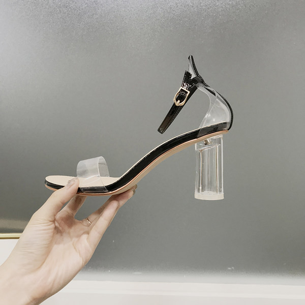 Stilīgas sieviešu sandales ar augstu caurspīdīgu papēdi