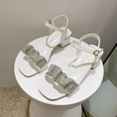 Sieviešu sandales ar akmeņiem melnā un baltā krāsā - zems papēdis